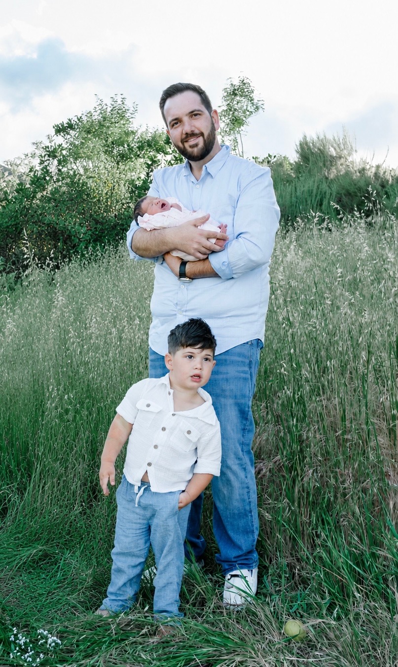 Peter Yahiayan with his children outdoors